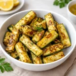 Easy Grilled Blackstone Zucchini on a white platter