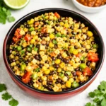 A pan of freshly baked golden Strawberry Shortcake Bars with a sliced square.